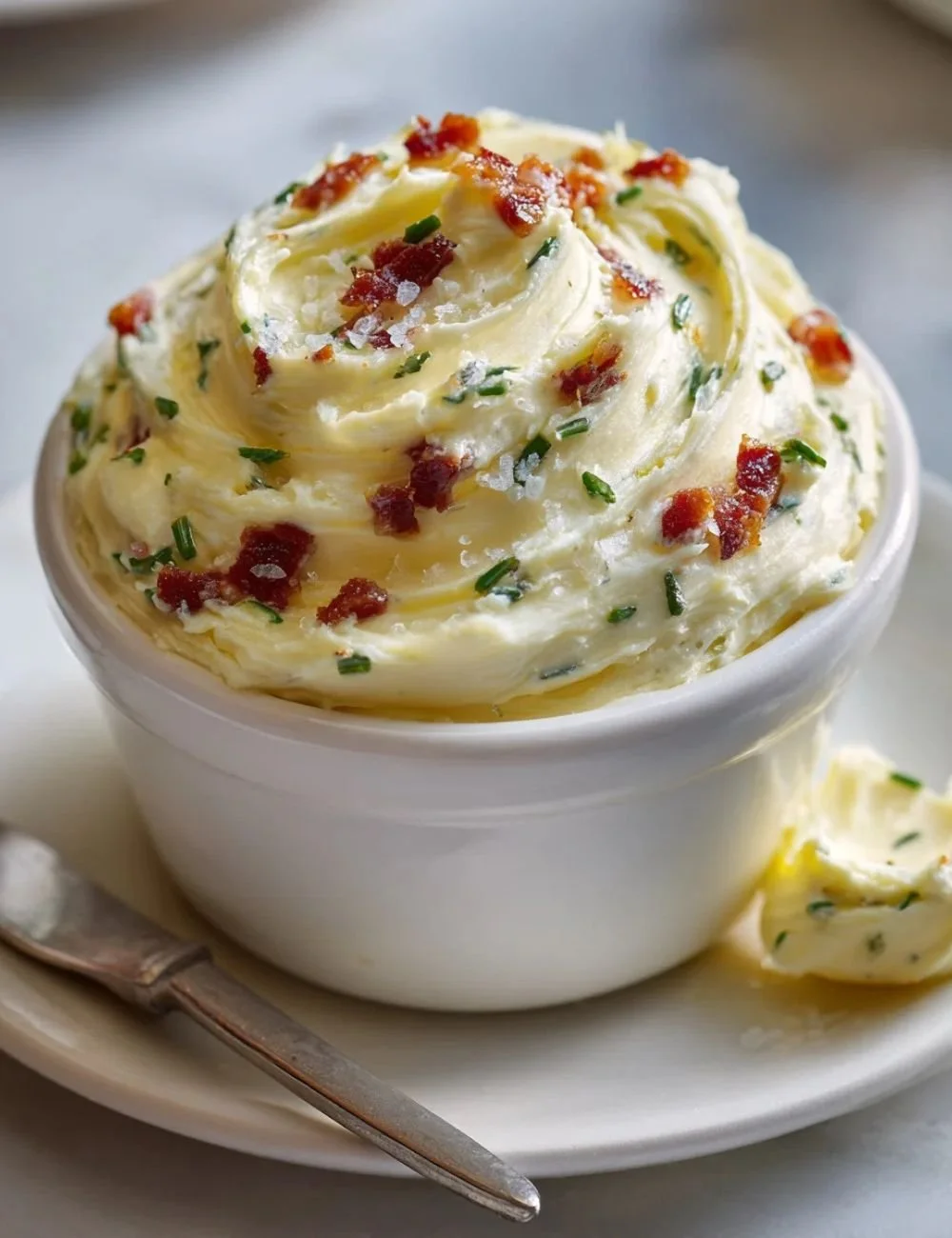 Delicious beef bacon butter spread on toast, enhancing flavors with a meaty twist.