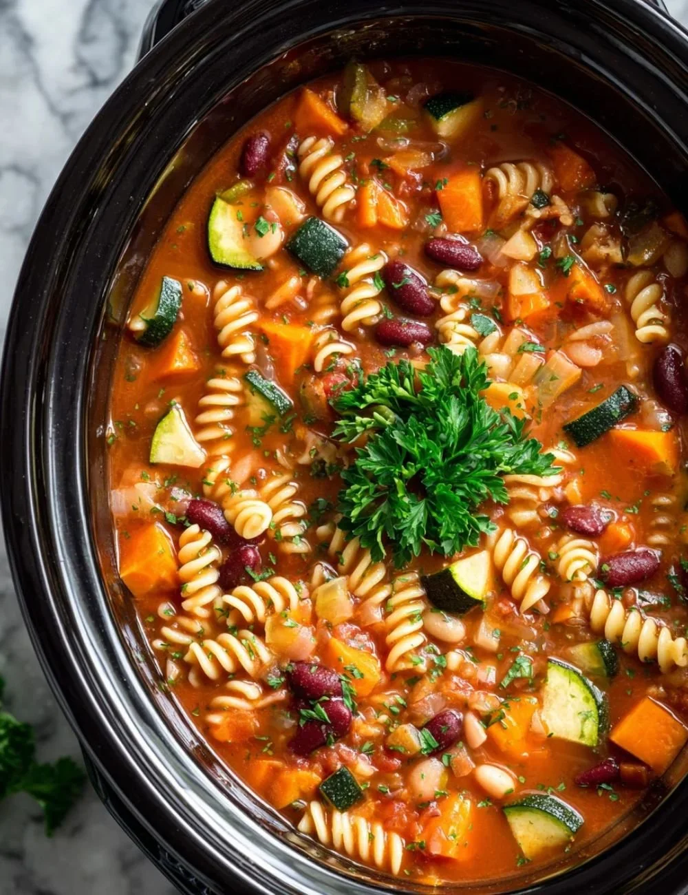 Bowl of delicious Minestrone Soup with vegetables and pasta