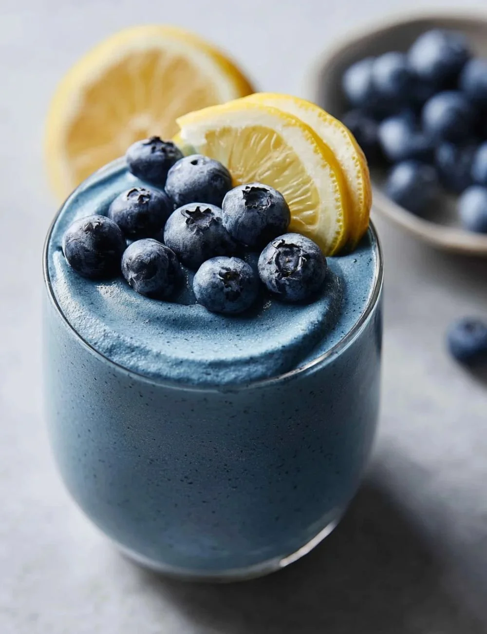 Refreshing anti-inflammatory lemon blueberry smoothie in a glass