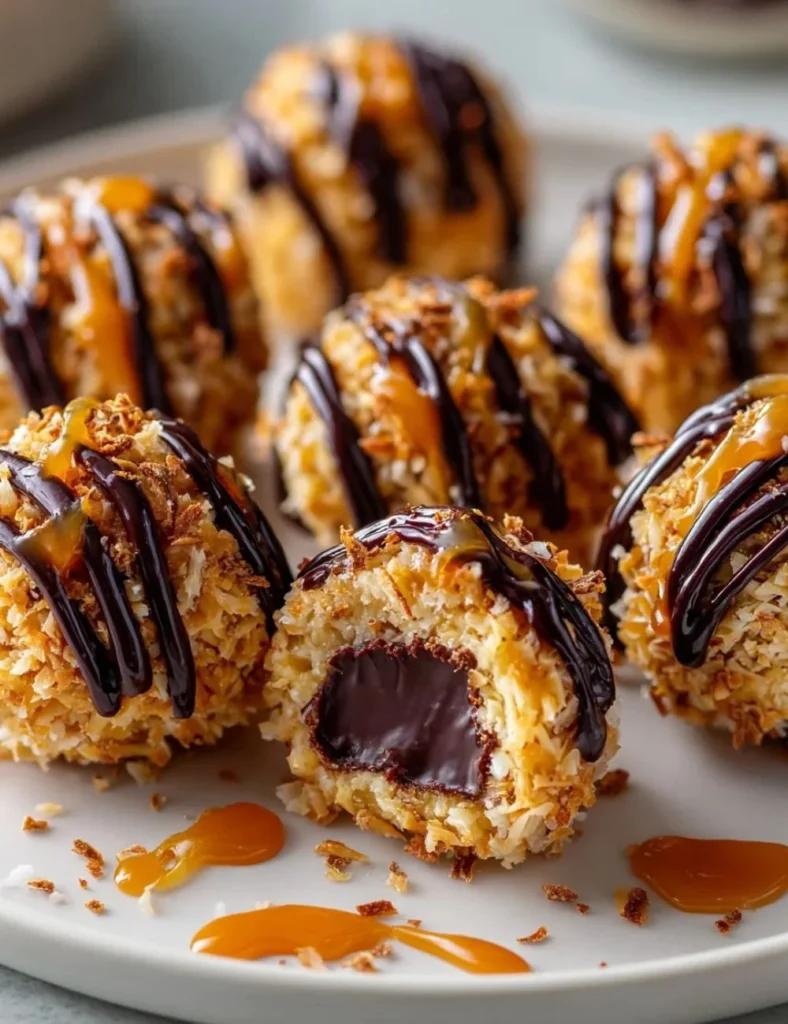 Delicious Samoa Truffles with rich chocolate coating and coconut filling.