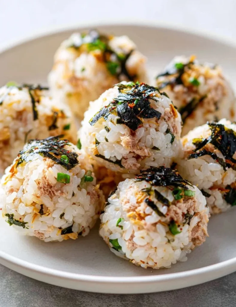 Homemade savory tuna rice balls with fresh ingredients and flavorful seasoning