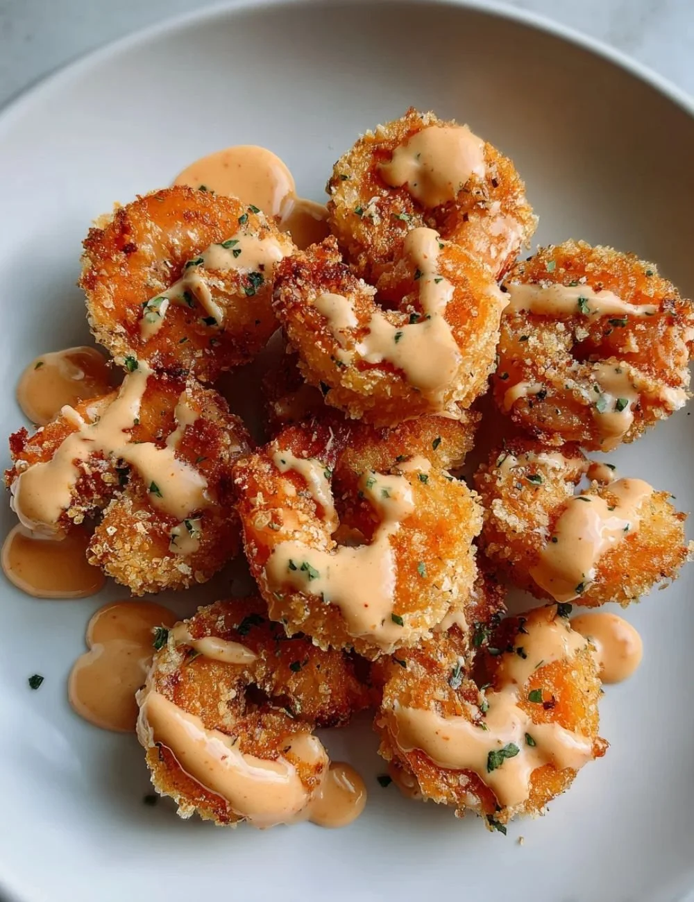 Delicious Air Fryer Bang Bang Shrimp served with a spicy sauce
