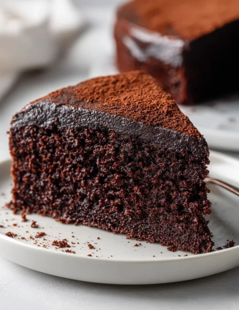 Healthy Sweet Potato Chocolate Cake topped with chocolate frosting