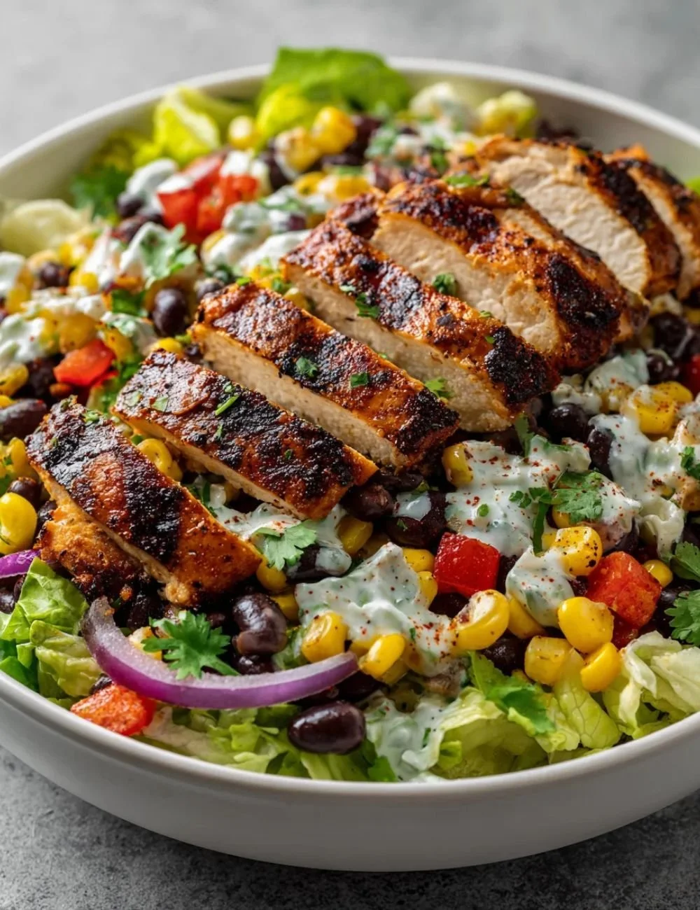 Colorful high protein salads with fresh ingredients and toppings.