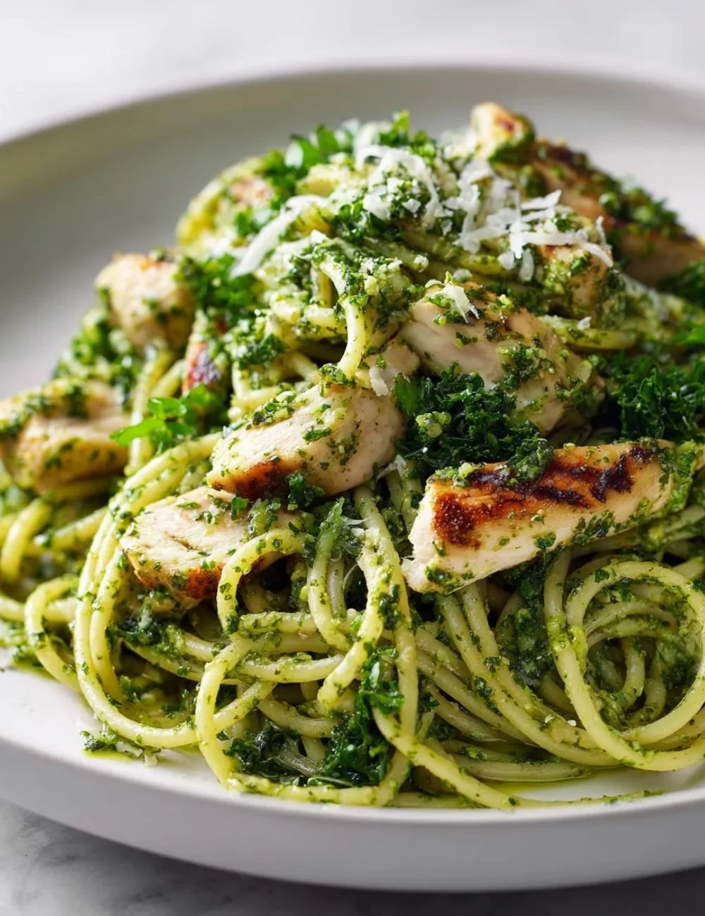 Delicious pesto chicken pasta recipe featuring non-alcoholic ale for added flavor.