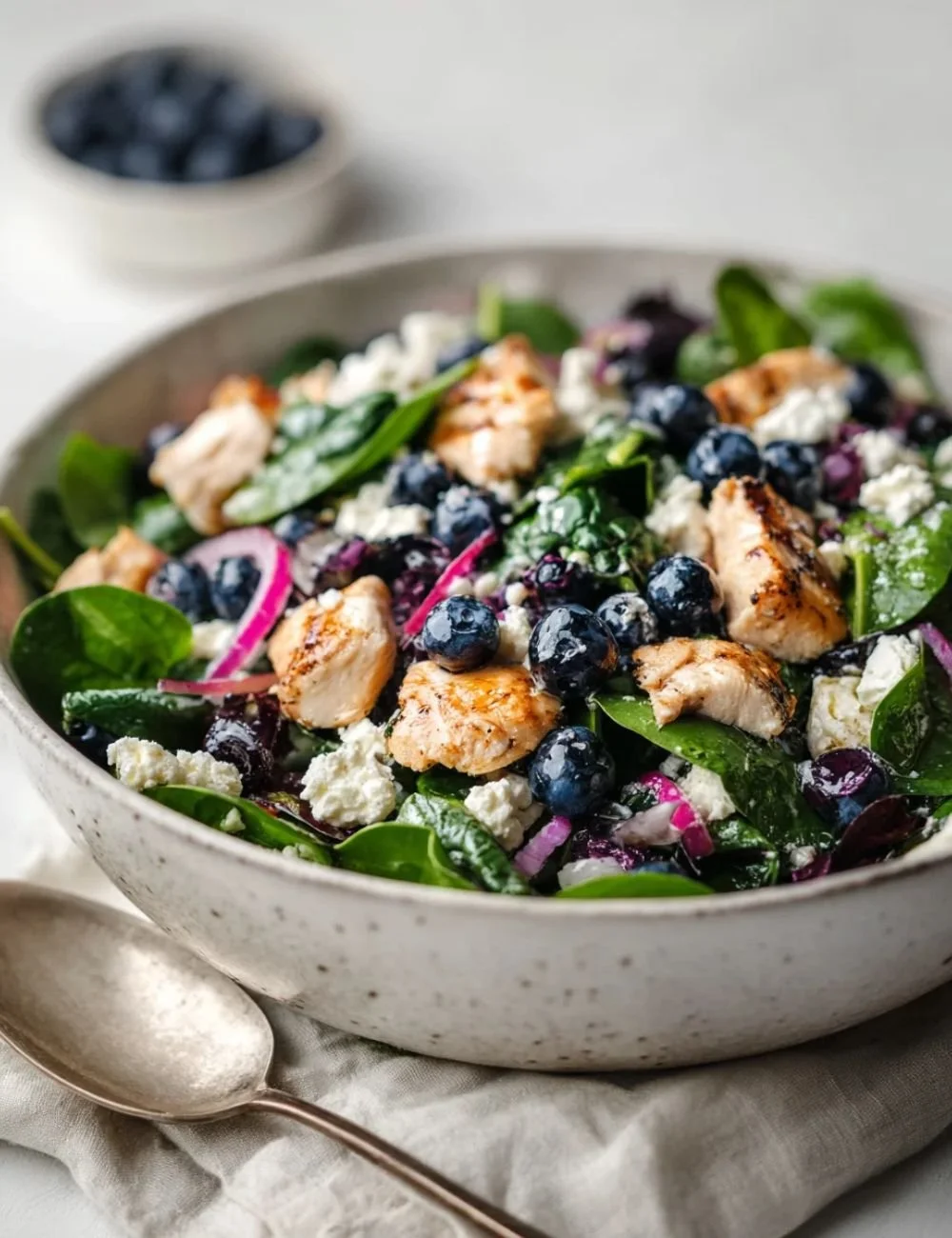 Healthy blueberry spinach chicken salad with fresh ingredients