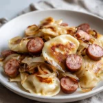 Classic perogies and sausage skillet dish served in a pan