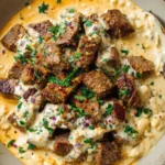 Delicious creamy garlic butter steak bites served on a plate