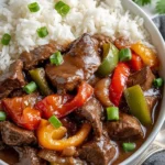 Crock Pot pepper steak with tender beef and colorful bell peppers