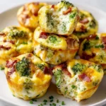 Broccoli beef bacon egg muffins served on a plate