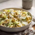 Healthy Greek yogurt Caesar pasta salad served in a bowl