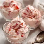 Delicious homemade strawberry filling in a bowl ready for cake