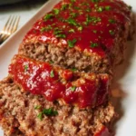 Delicious simple crock pot meatloaf served with sides