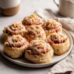 Deliciously baked Strawberry Crunch Sweet Rolls with a crunchy topping